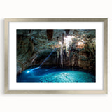 Textured abstract art print of Yucatan scenery in muted earth tones on a framed silver mat, ideal for bedroom art.