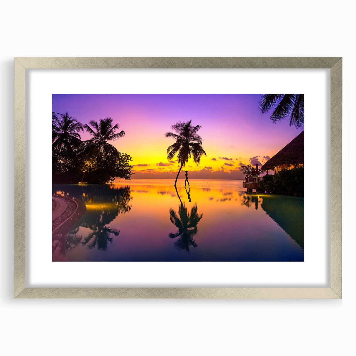 Textured art depicting an abstract oceanic scene in cool blue and green hues, framed with a silver mat.