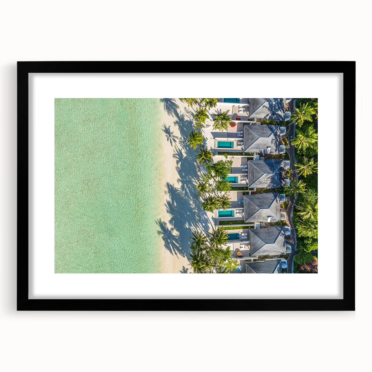 Extra large abstract art print of a colorful Tahitian seascape on textured canvas, framed in black.