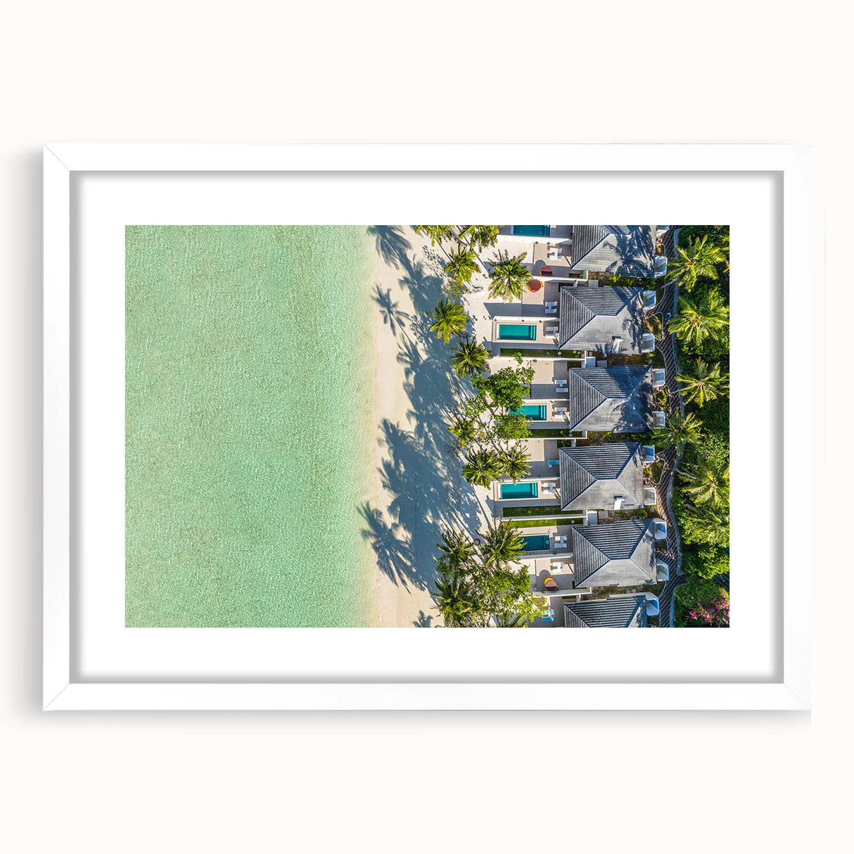 Abstract art print of a Tahitian landscape in cool blue and green hues on a white framed canvas.