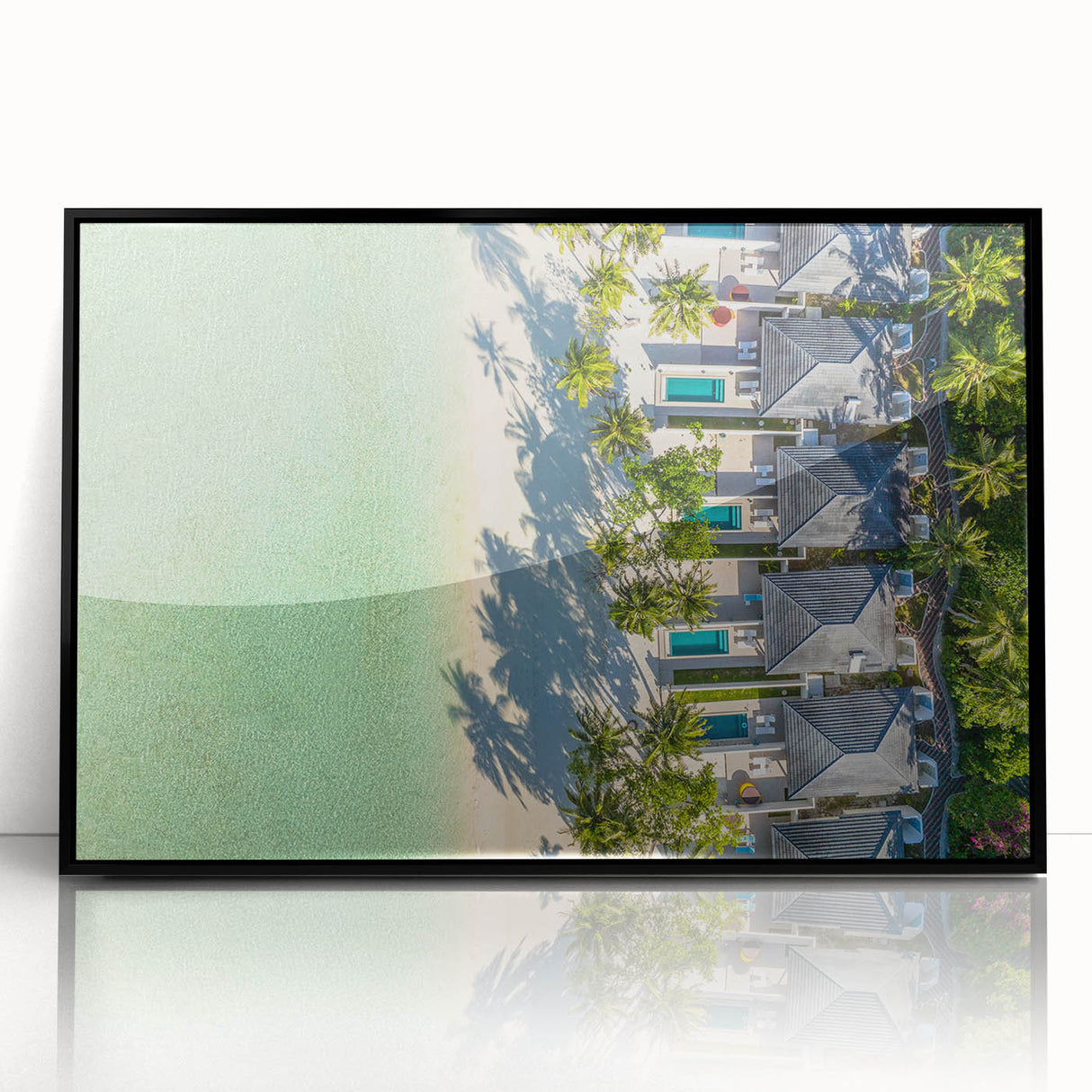 Large abstract wall art depicting a serene Tahitian landscape in soft blue and green tones, framed in black acrylic.