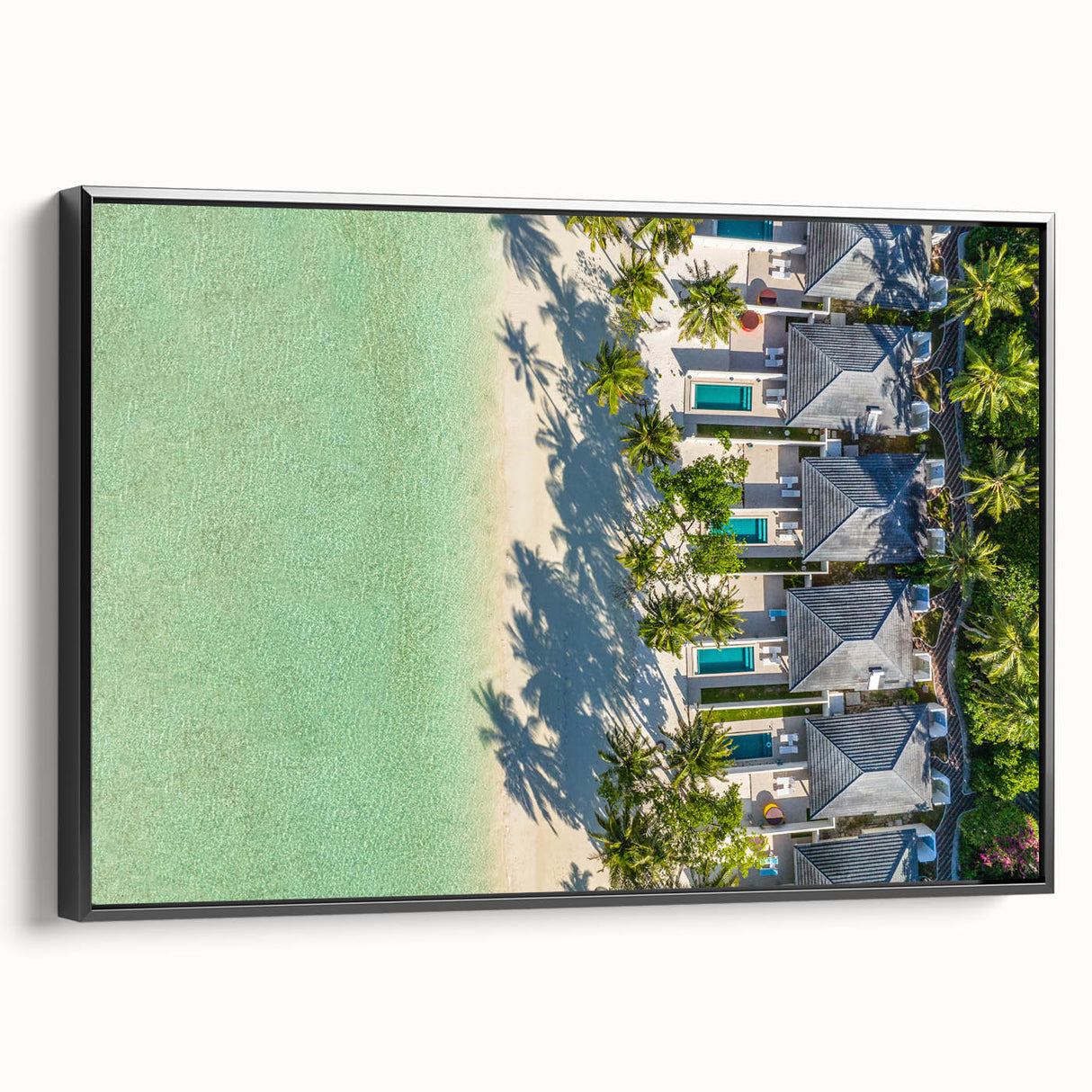 Black and white framed canvas of a Tahitian landscape, ideal for bedroom wall decor.