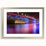 Textured abstract art print of Auckland skyline in muted blues and grays on a framed canvas, suitable for bedroom art.