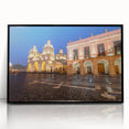 Large abstract wall art depicting a stylized scene of South America in muted earth tones, framed in black acrylic.