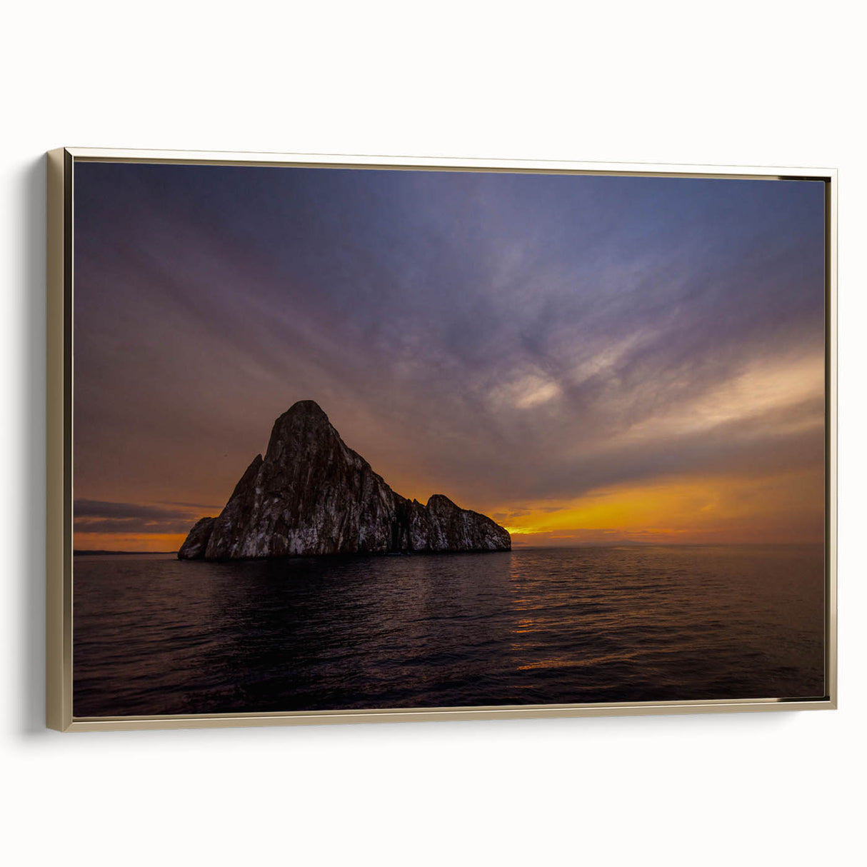Framed canvas featuring a vintage-style landscape of the Galapagos with lush greenery and a black border.