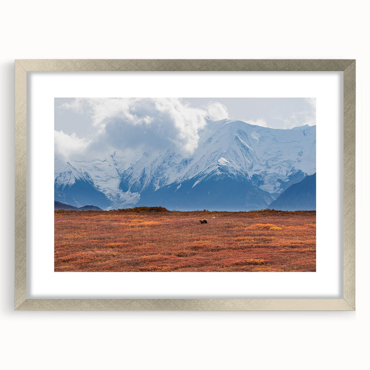 Textured abstract art print of Denali, Alaska, in muted earth tones on a framed canvas, suitable for bedroom decor.
