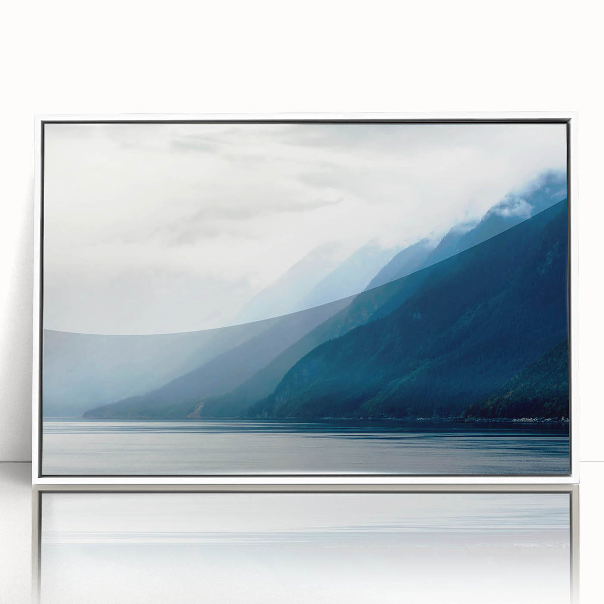 Framed acrylic print of a serene Alaskan landscape in muted blue and white tones, ideal for modern nursery wall decor.