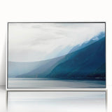 Framed acrylic print of a serene Alaskan landscape in muted blue and white tones, ideal for modern nursery wall decor.