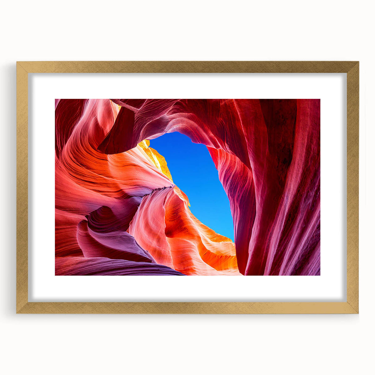 Extra large textured abstract art print of Arizona's Antelope Canyon in gold frame, suitable for living room decor.
