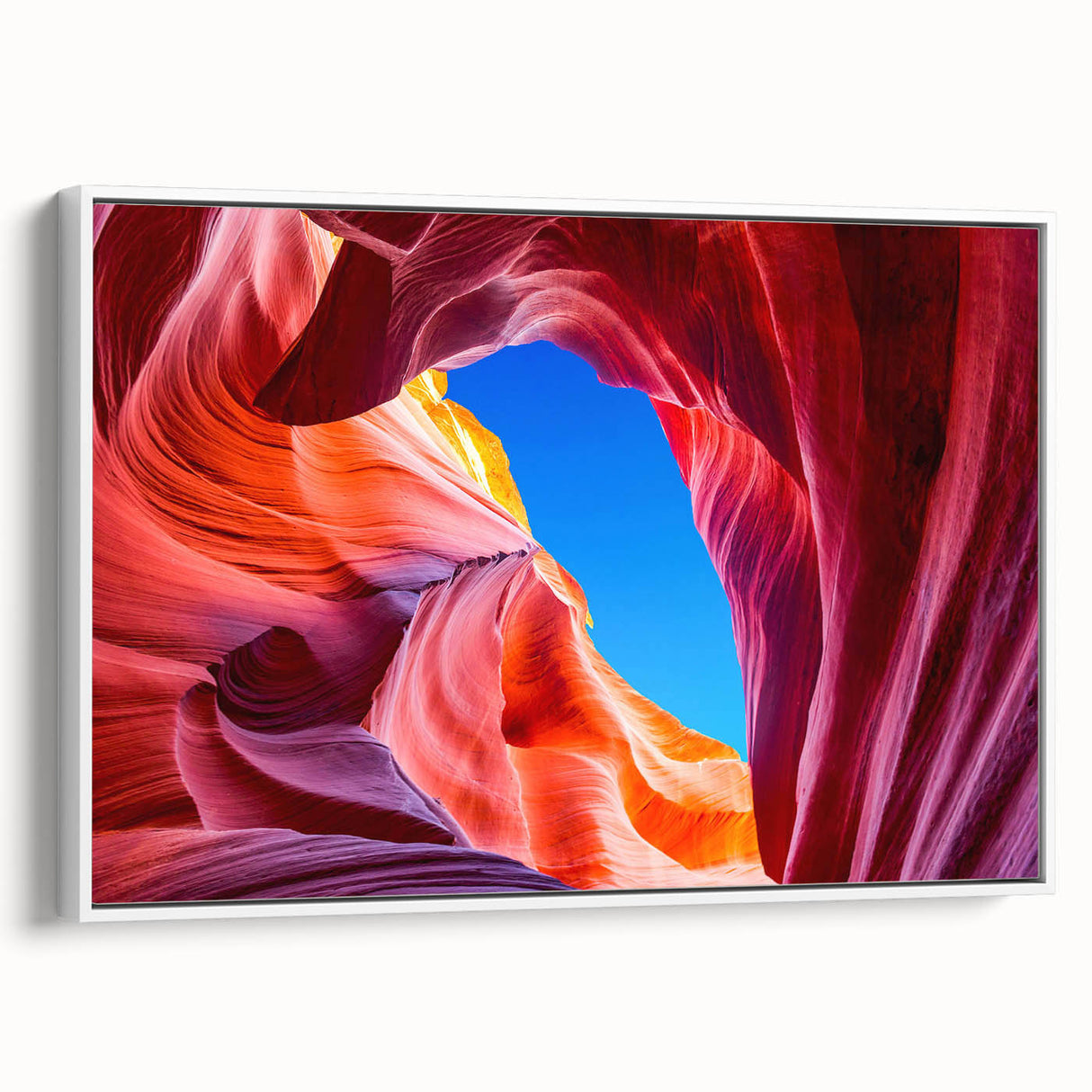 Extra large framed canvas of vintage poster art depicting the Antelope Canyon in Arizona, featuring vibrant, colorful hues.