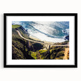 Abstract art print of Big Sur in vibrant colors on a textured, extra large canvas, framed in black.