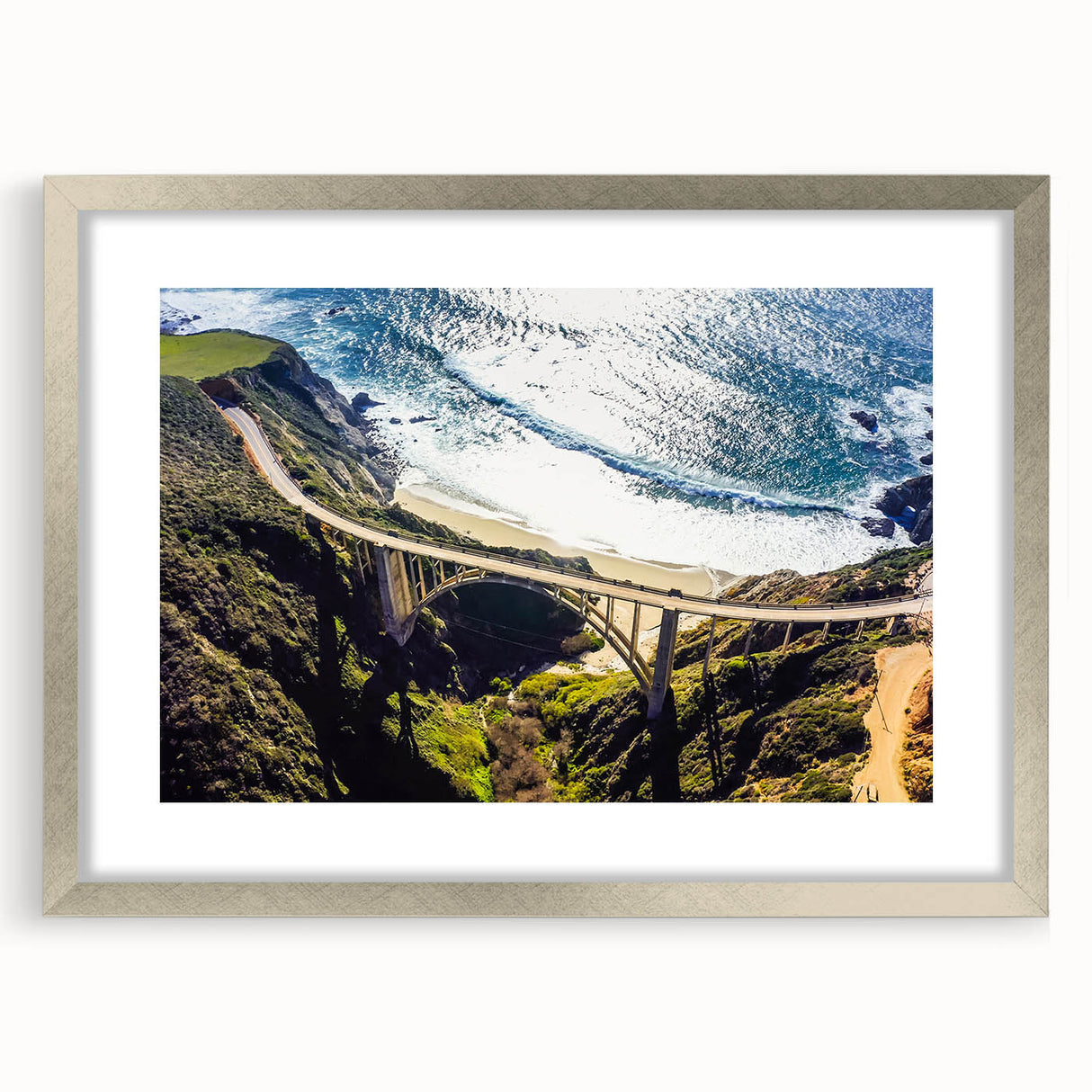 Textured abstract art print of California's Big Sur in muted earth tones on a framed silver mat, ideal for bedroom art.