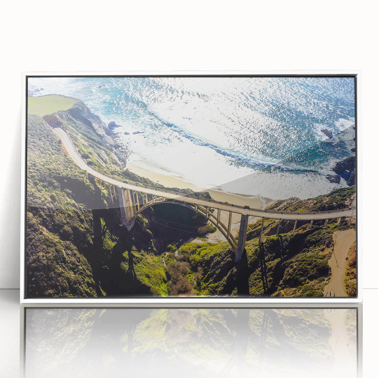 Acrylic print of the Big Sur coastline in soft pastel colors, framed in white, suitable for modern art wall decor.