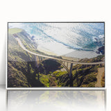 Acrylic print of the Big Sur coastline in soft pastel colors, framed in white, suitable for modern art wall decor.