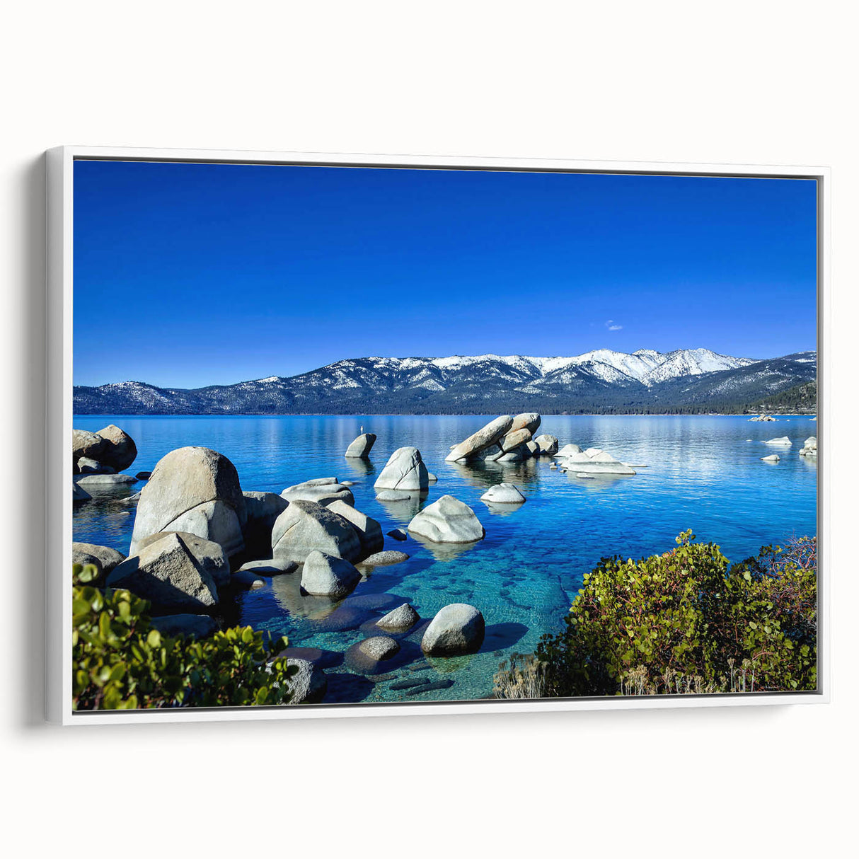 Vintage poster art of Lake Tahoe on a large framed canvas, featuring colorful art in pastel shades.