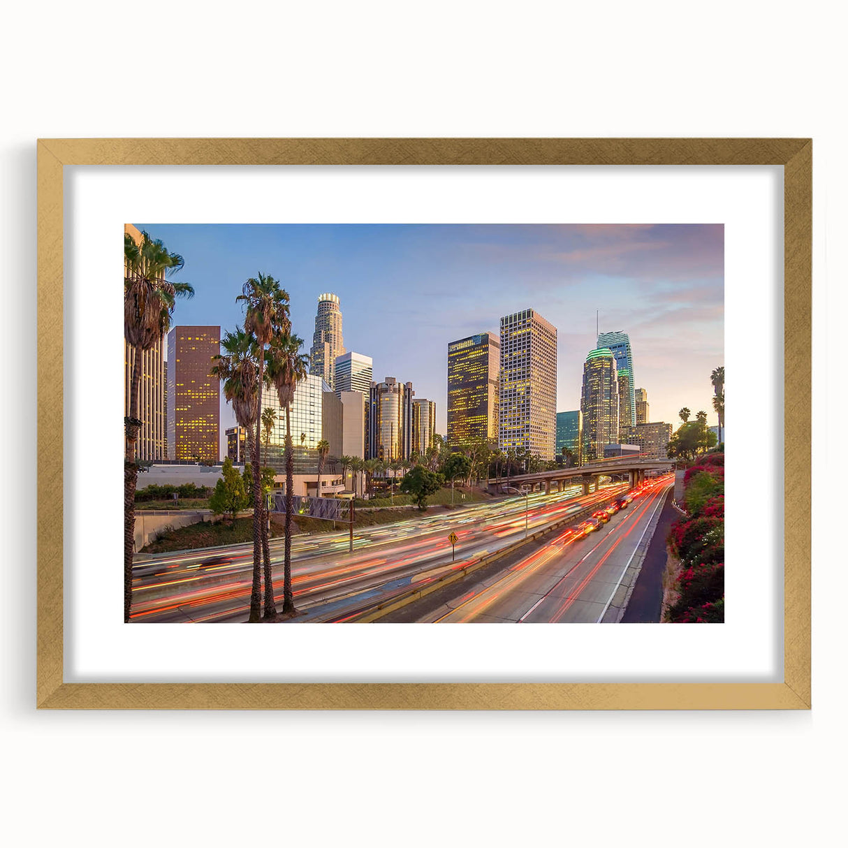 Extra large abstract art print of Los Angeles skyline in muted gold and blue tones on a framed canvas.