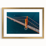 Extra large abstract art print depicting San Francisco scenery in textured blues and golds, framed in gold.