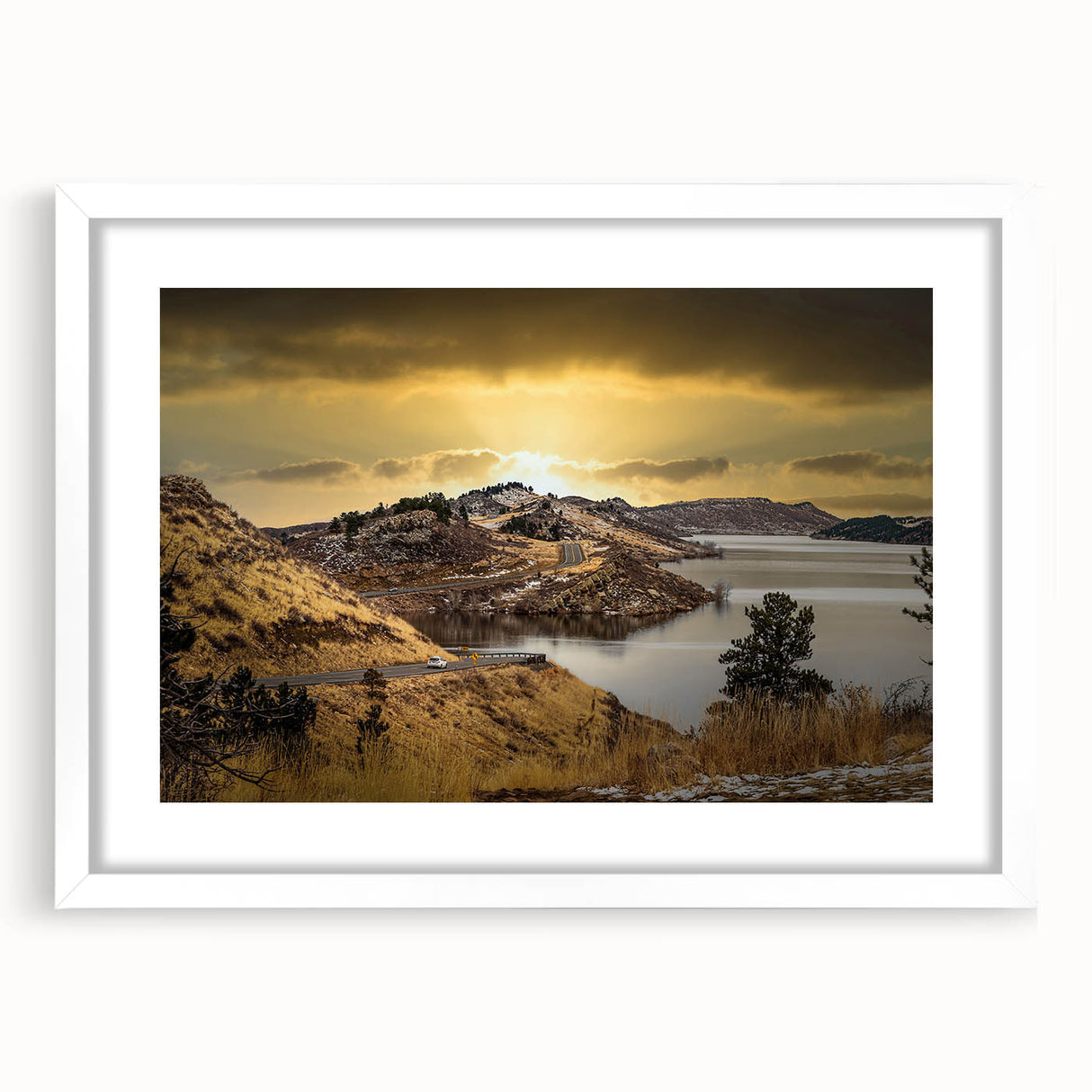 Abstract art print of Colorado Springs in muted earth tones on a framed white mat, suitable for bedroom or dining room decor.