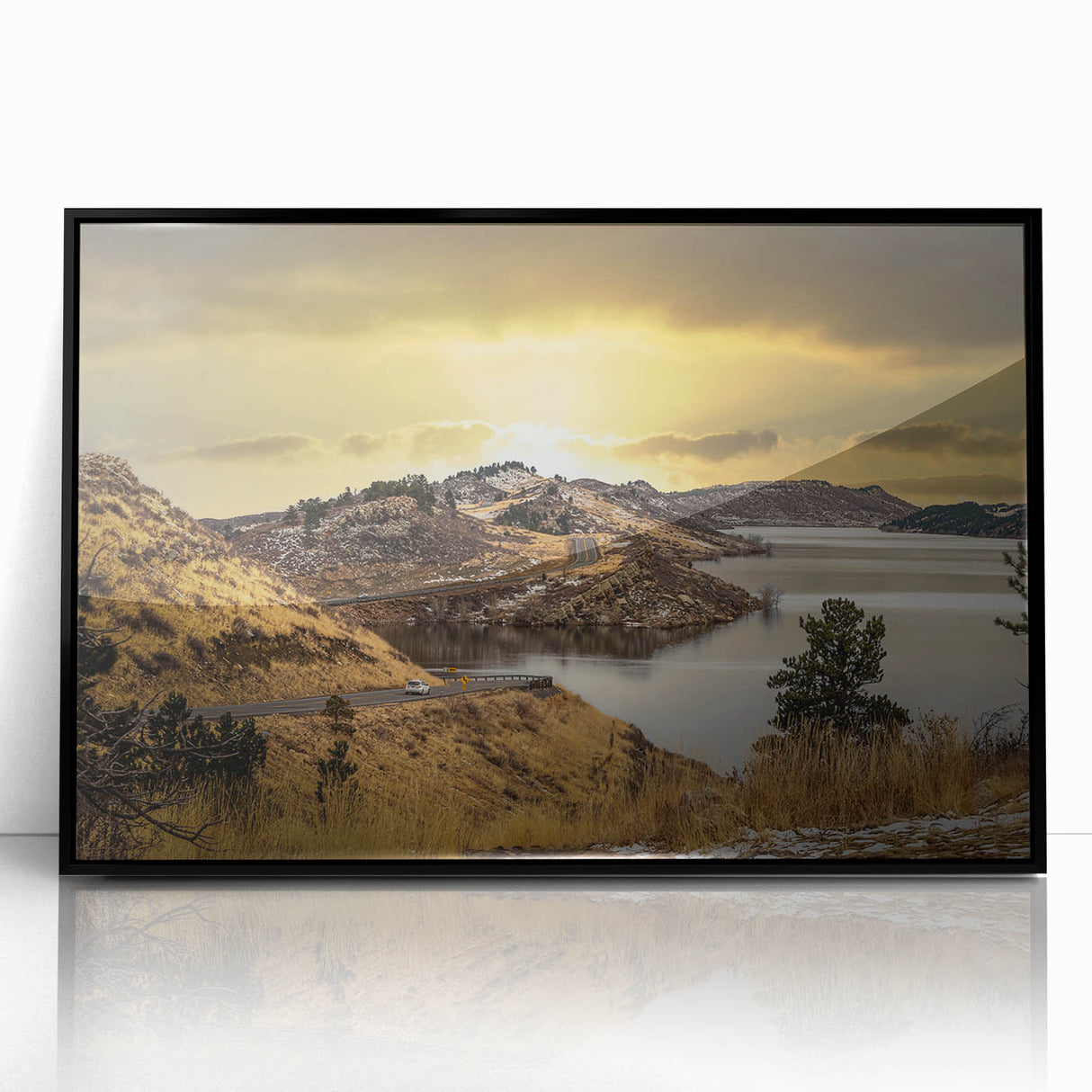 Large abstract wall art depicting Colorado Springs in muted earth tones, framed in black acrylic.