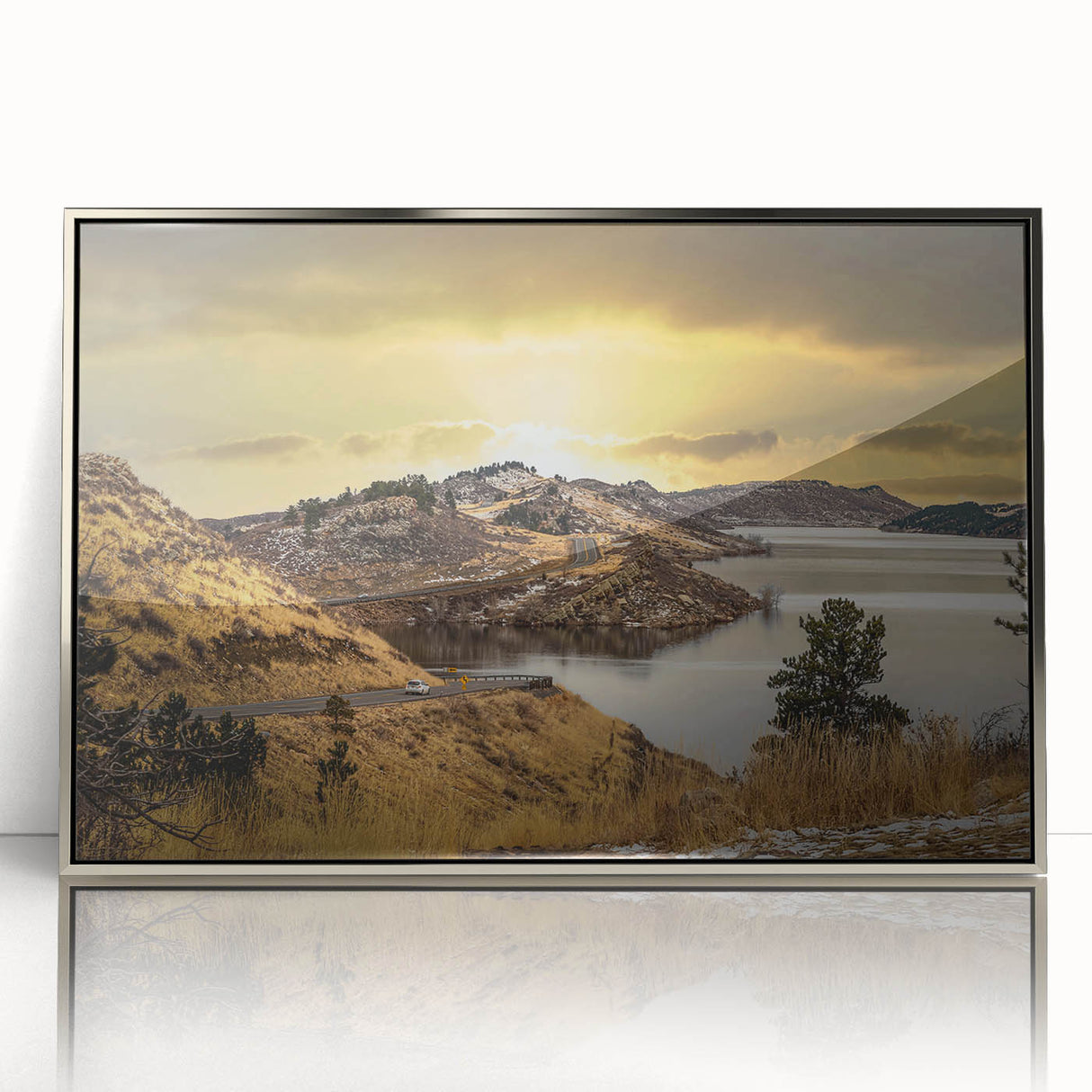Mid-century modernist art of Colorado Springs scenery in silver-framed acrylic, featuring muted earth tones.