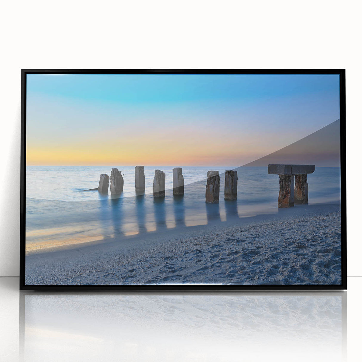 Large abstract wall art depicting the Florida Keys in muted blue tones, framed in black acrylic.
