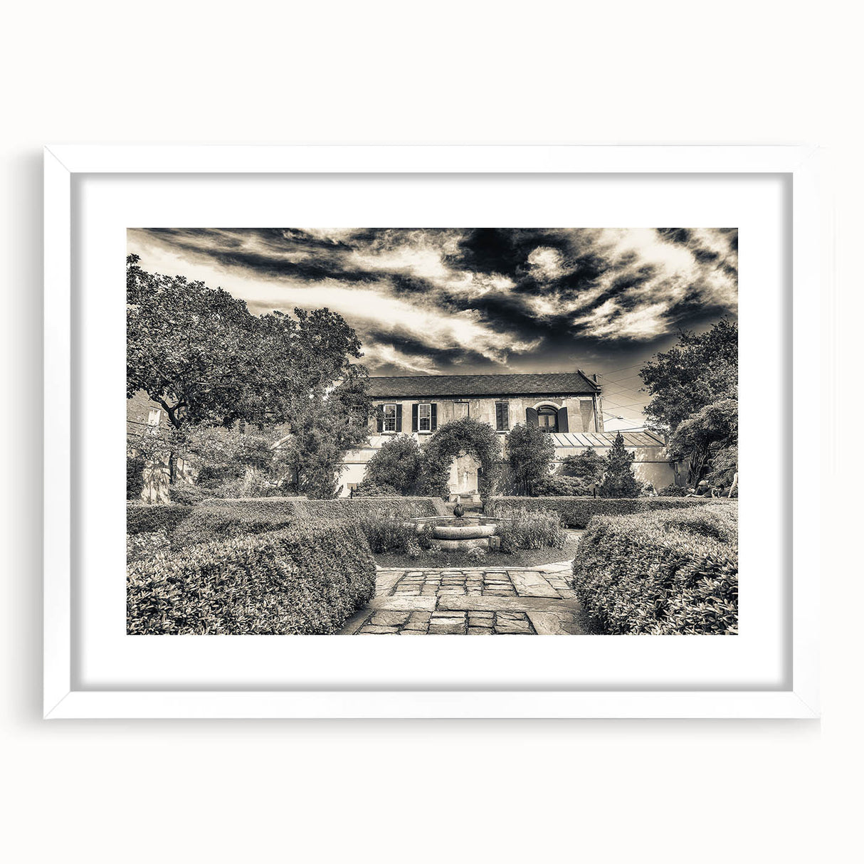 Abstract art print of Savannah scenery in muted green and blue tones on a framed white mat, ideal for dining room decor.
