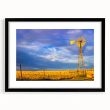 Extra large abstract art print of a colorful, textured Kansas scenery on a black framed canvas, ideal for living room decor.