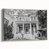 Framed canvas of a vintage-style New Orleans landscape in black with colorful accents, ideal for living room decor.