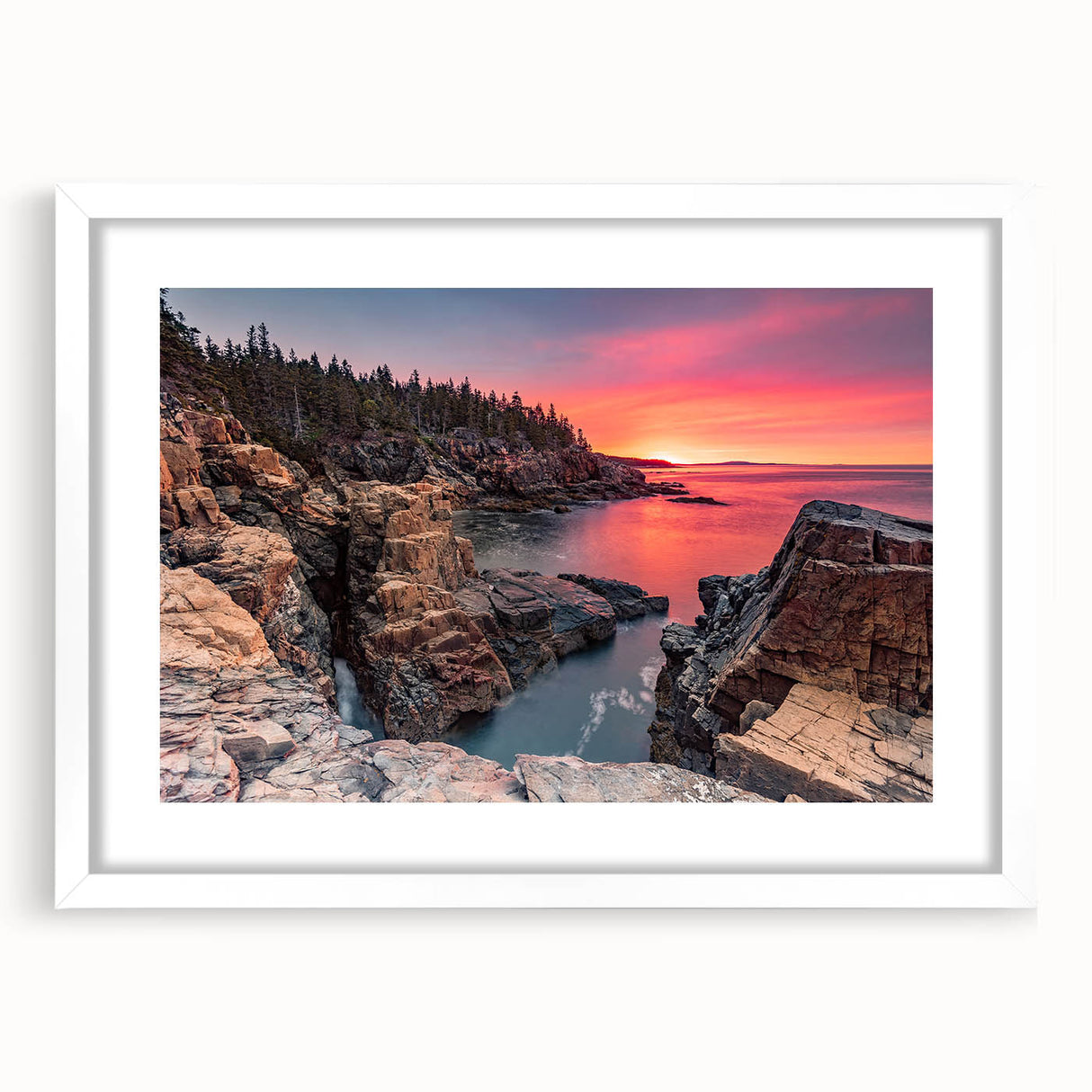 Abstract art print of Acadia, Maine, in muted blue and green tones on a framed white mat.