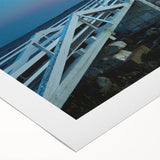 Art deco poster featuring a serene Maine landscape in muted green and blue tones on rolled canvas.