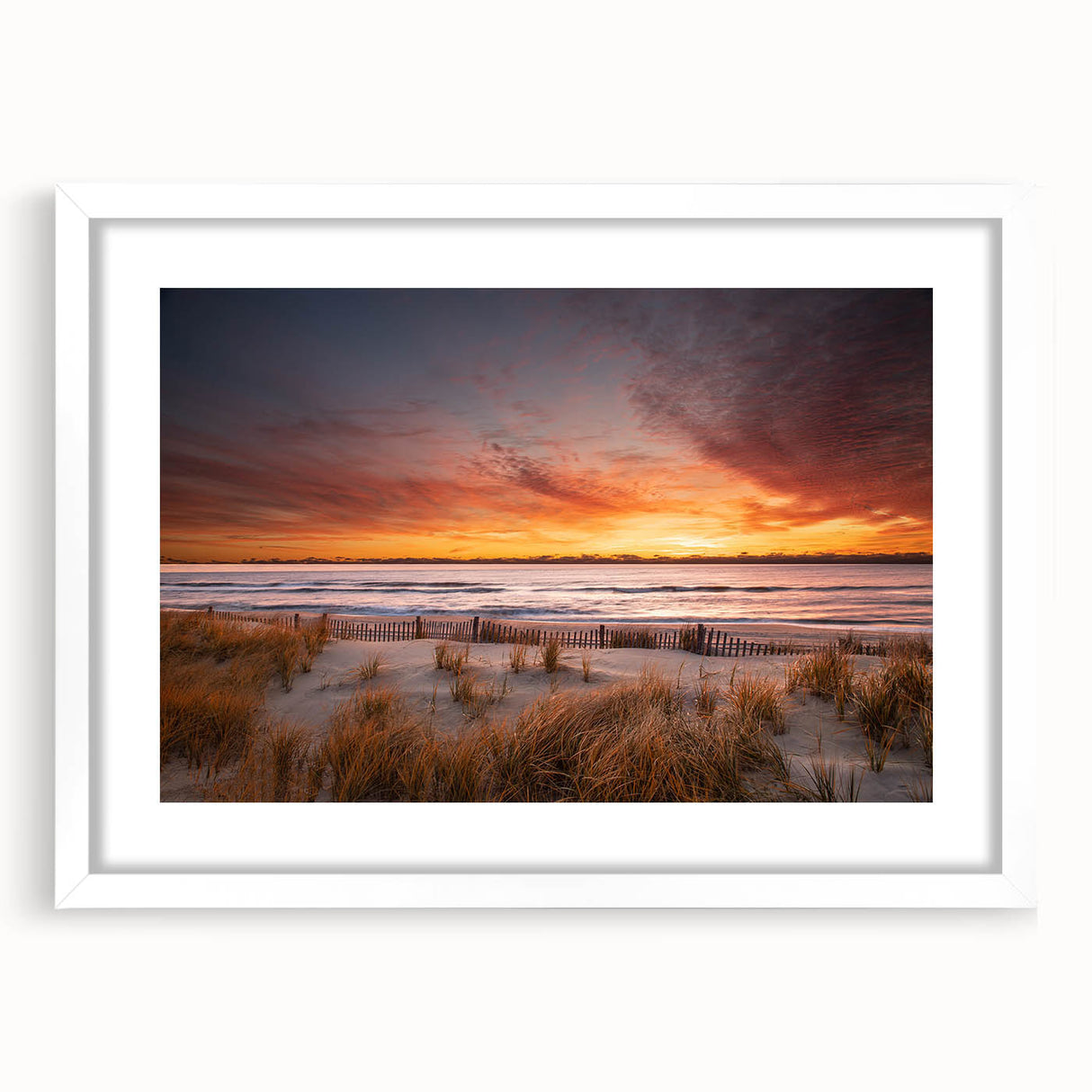 Abstract art print of New Jersey scenery in muted blue and green tones, framed in white, suitable for dining room decor.