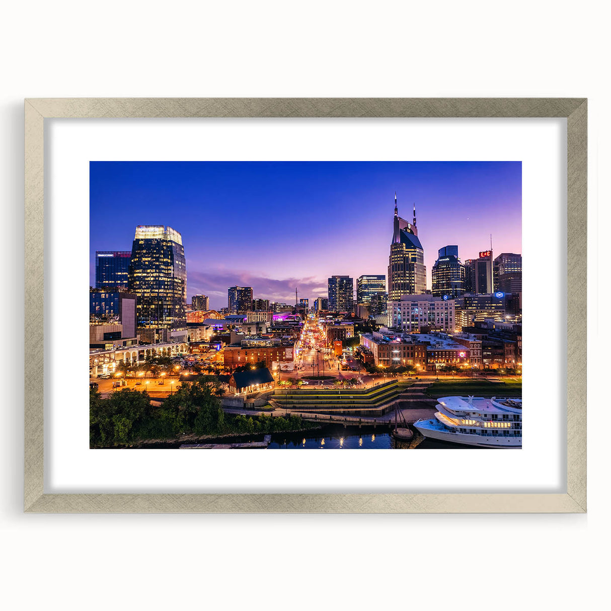 Textured art print of Nashville skyline in abstract style with muted colors on a framed silver mat, ideal for bedroom art.
