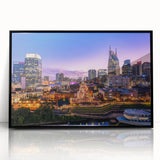 Large abstract wall art depicting the Nashville skyline in muted gray and blue tones, framed in black acrylic.