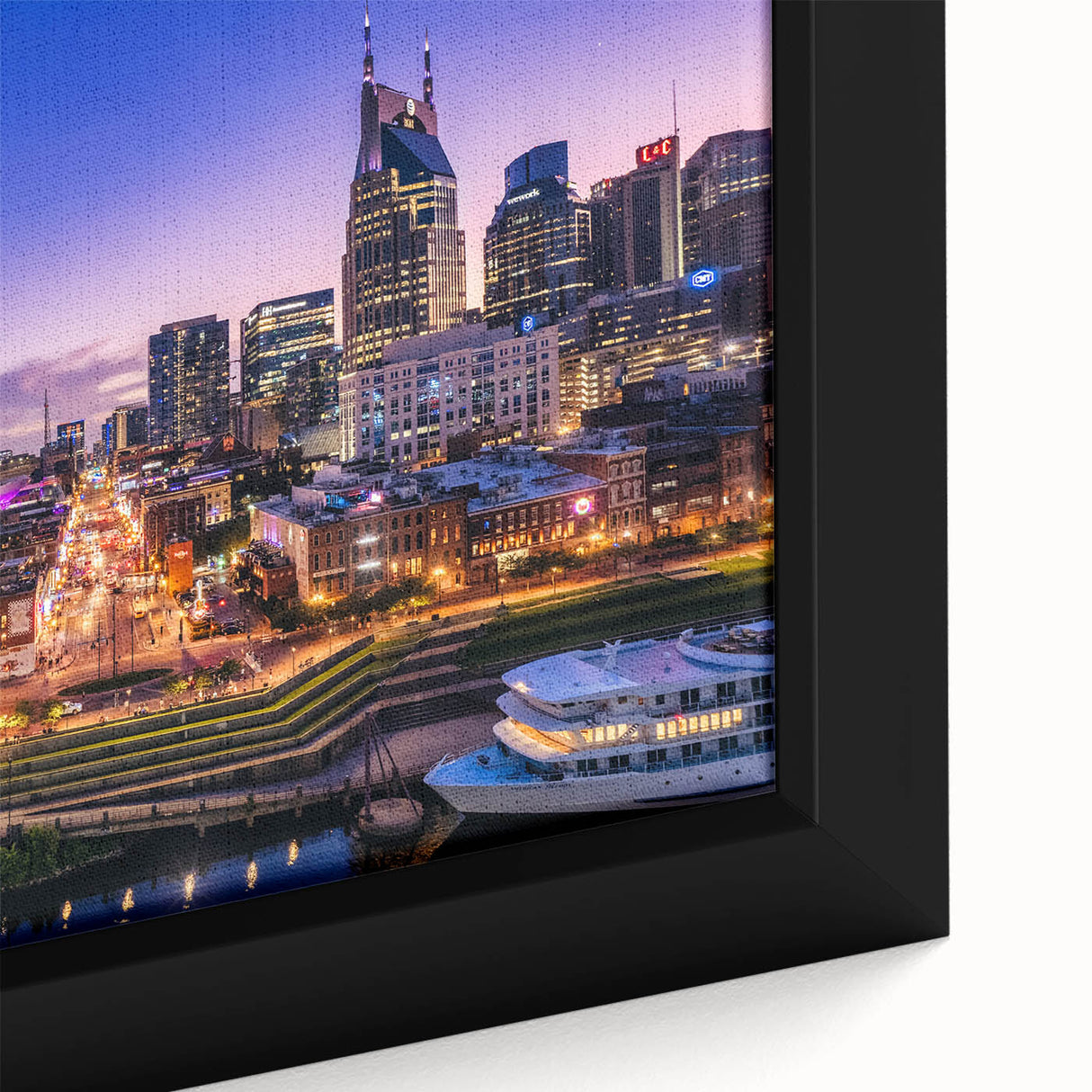Framed canvas of a textured Nashville skyline in black with colorful accents, ideal for large living room walls.
