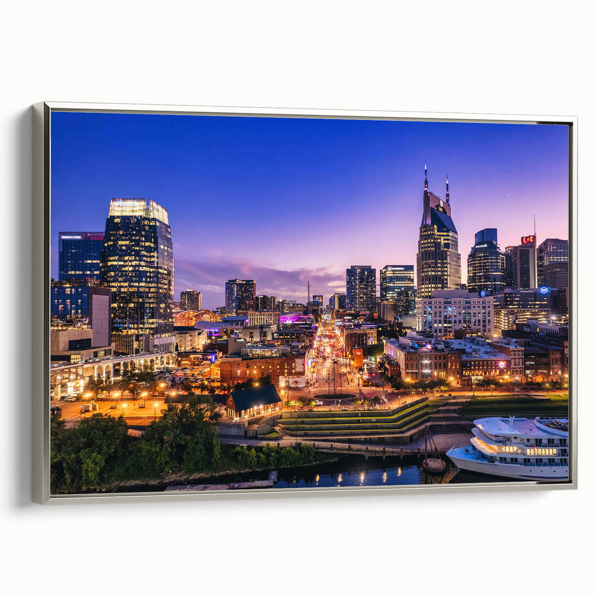 Framed canvas of Nashville skyline in colorful vintage style, ideal for office or living room decor.