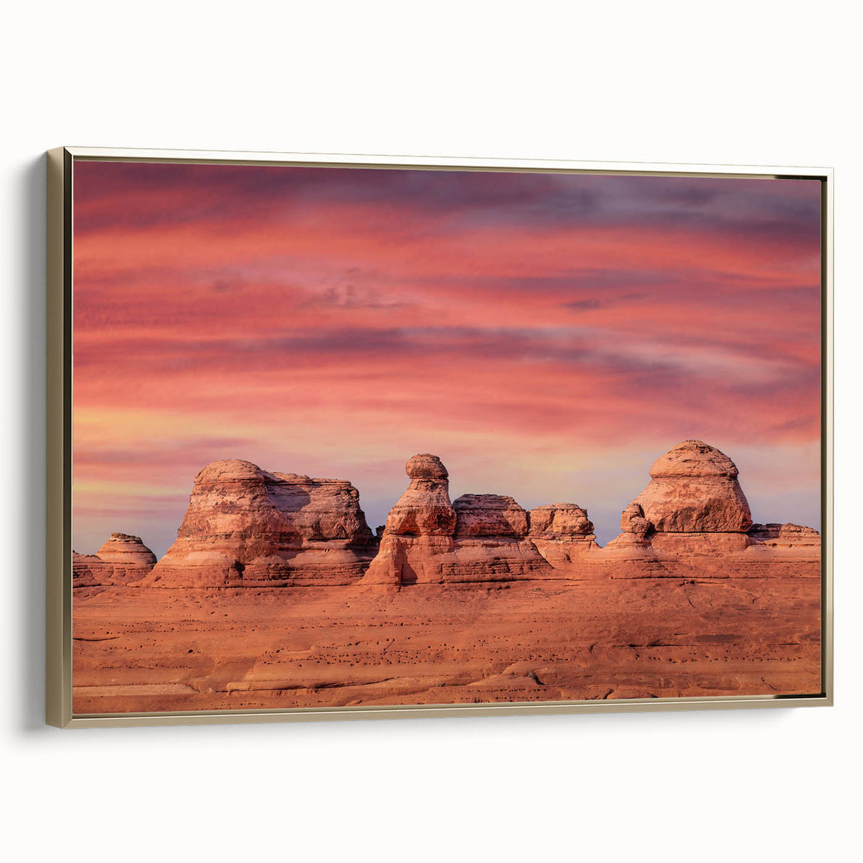 Framed canvas featuring a landscape painting of Arches National Park in Utah, rendered in earth tones.