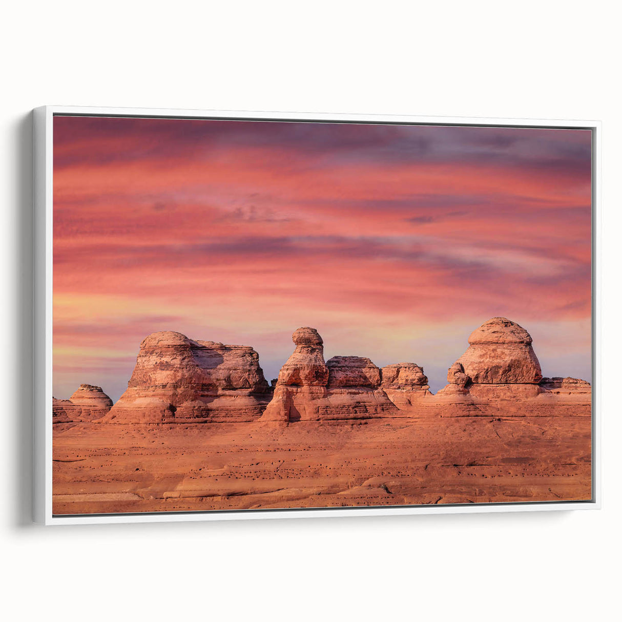 Vintage poster art of Arches National Park on framed canvas, featuring earthy red tones, ideal for living room decor.