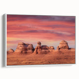 Vintage poster art of Arches National Park on framed canvas, featuring earthy red tones, ideal for living room decor.