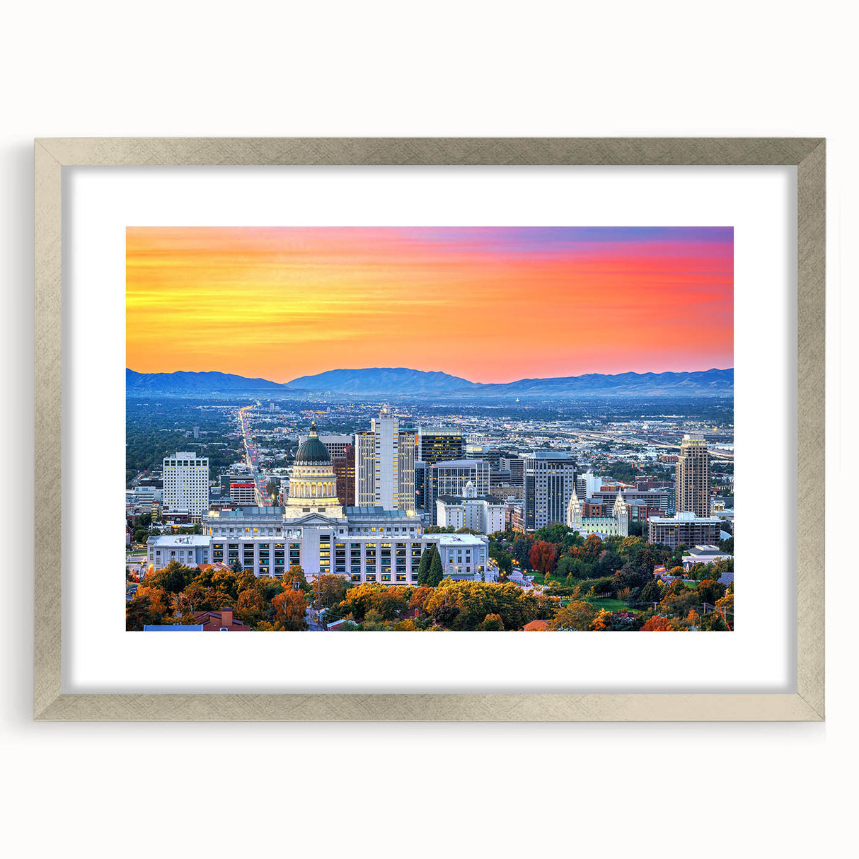 Abstract art print of Salt Lake City with muted blue and gray tones on a framed silver mat, suitable for dining room decor.
