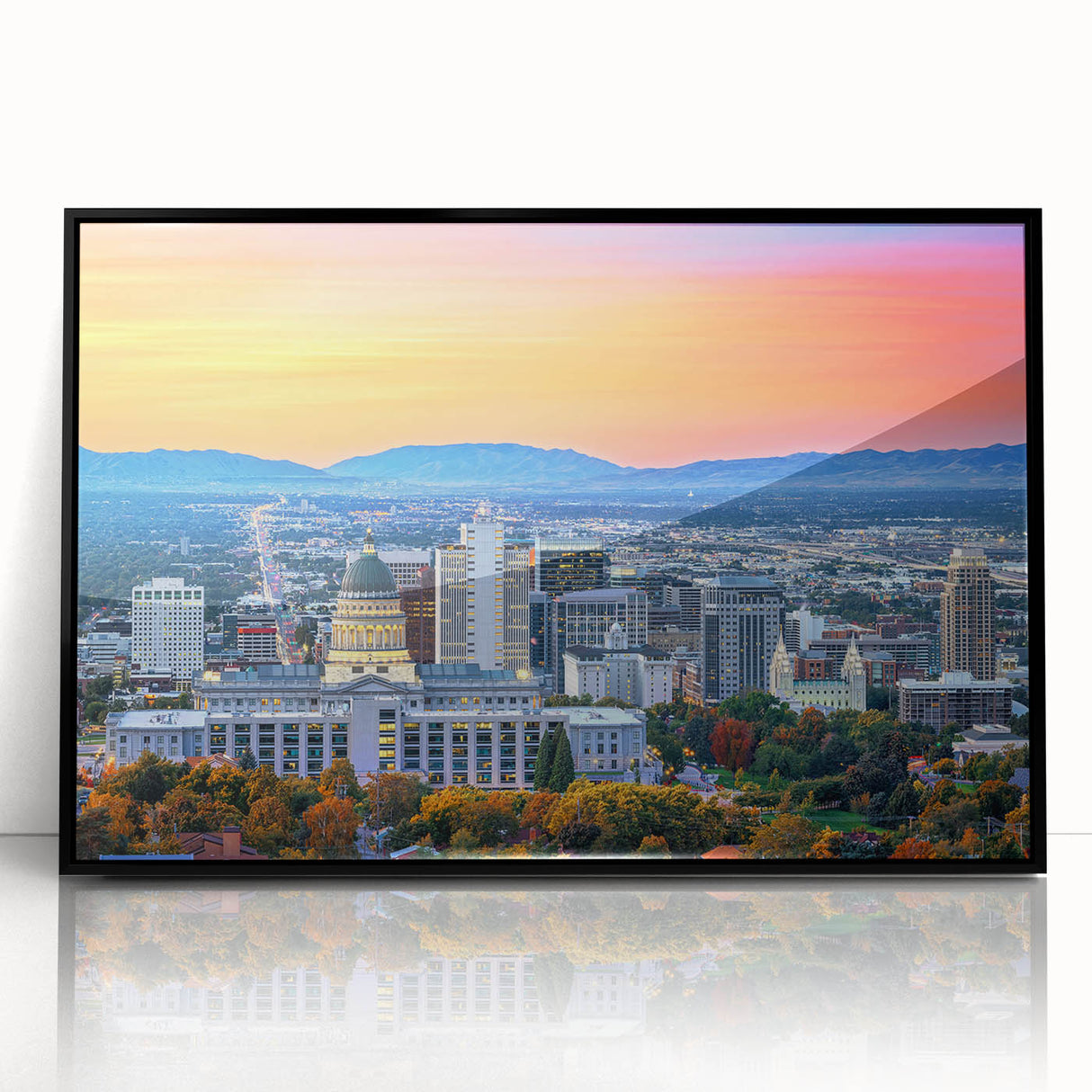 Large abstract wall art of Salt Lake City in muted gray and blue tones on a framed acrylic.