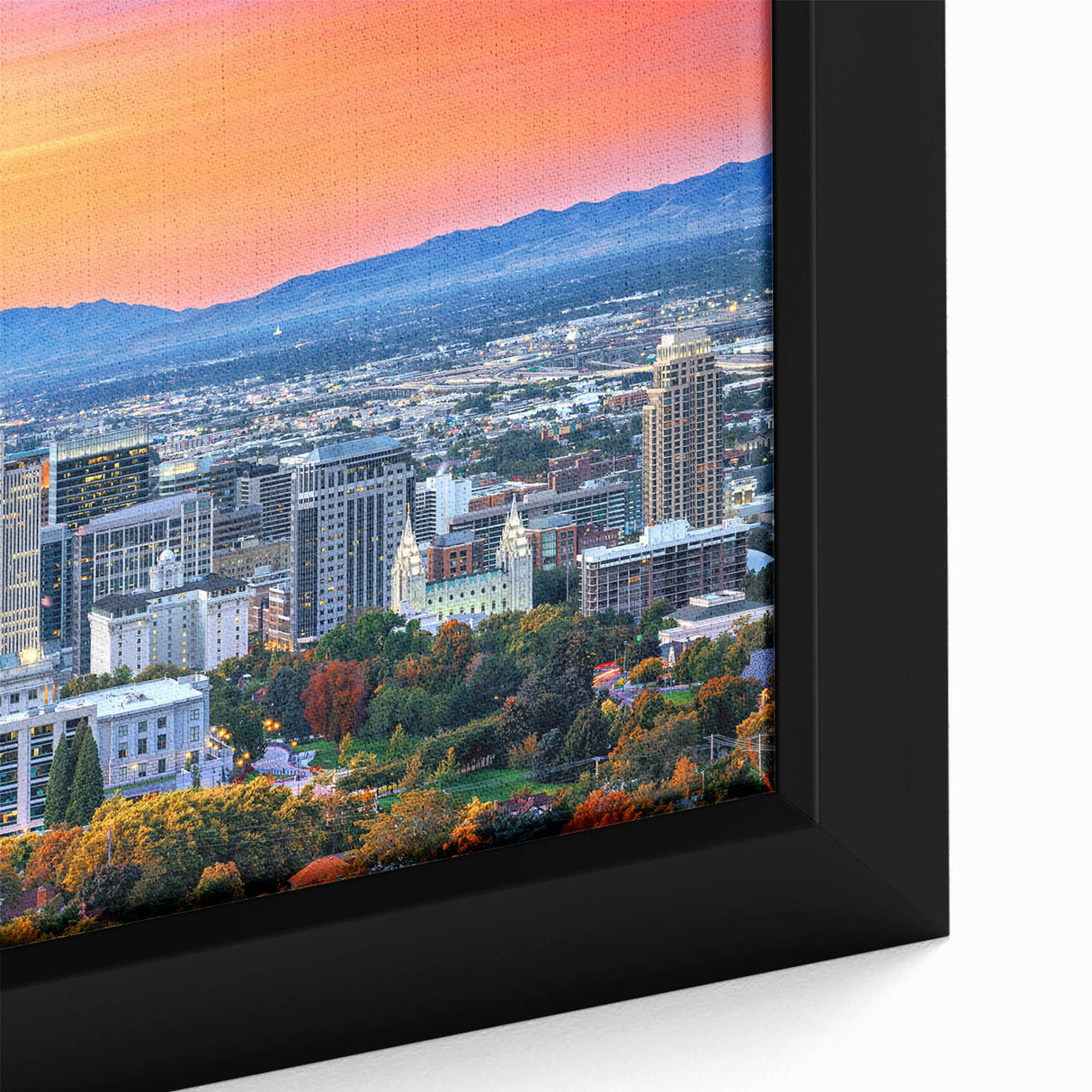 Black wall art featuring a textured close-up of Salt Lake City, with vivid colors on a framed canvas.