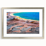 Textured art depicting abstract Yellowstone scenery in silver frame, ideal for modern bedroom ambiance.