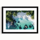 Black-framed landscape artwork showcasing a serene beach scene with gentle waves and soft clouds, designed to enhance home decor in coastal or modern themes.