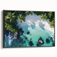 Framed canvas artwork depicting a serene beach landscape with vibrant blue skies and gentle waves, featuring a sleek black frame for modern decor appeal. Perfect for coastal-themed interiors, this piece captures tranquility and nature's beauty.