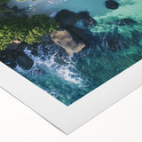 Vibrant landscape canvas print showcasing a serene beach scene with golden sands and turquoise waters, elegantly rolled for easy display and shipping.
