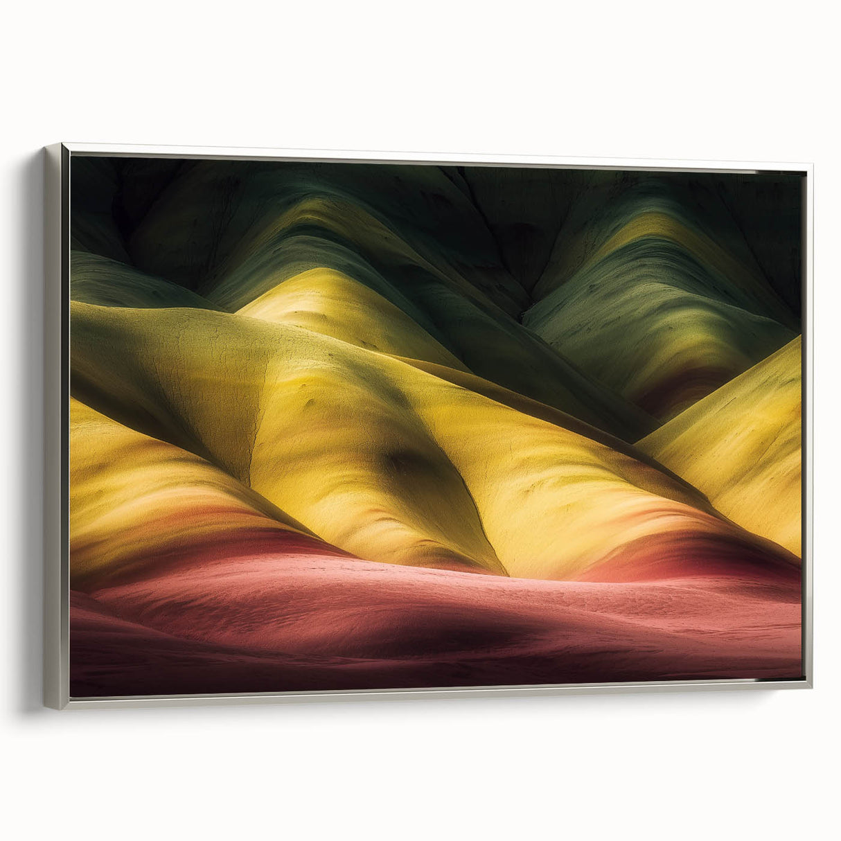 Framed canvas artwork depicting a stunning landscape of canyons, featuring rich earth tones and silver accents, ideal for modern home decor and art enthusiasts.