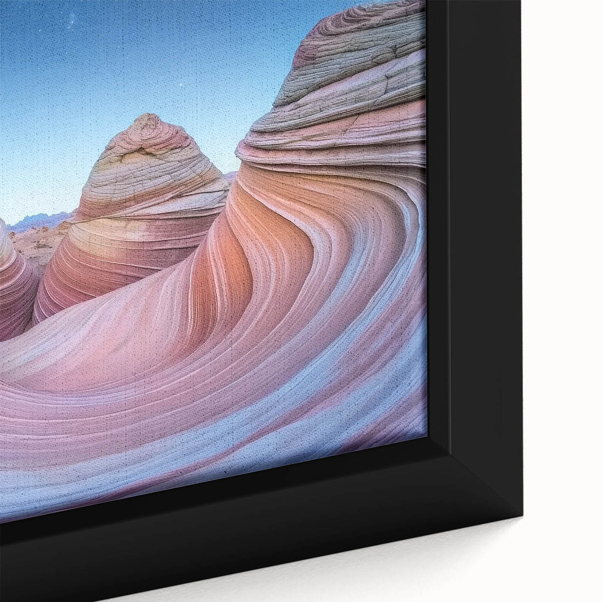 Close-up of a framed landscape canvas showcasing vibrant canyons with rich earthy tones, perfect for enhancing home decor and adding a natural element to any room.