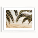 Abstract art print featuring swirling blue and green tones on a white framed canvas.