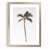 Textured abstract art print in silver frame, featuring swirling gray patterns on a white background.