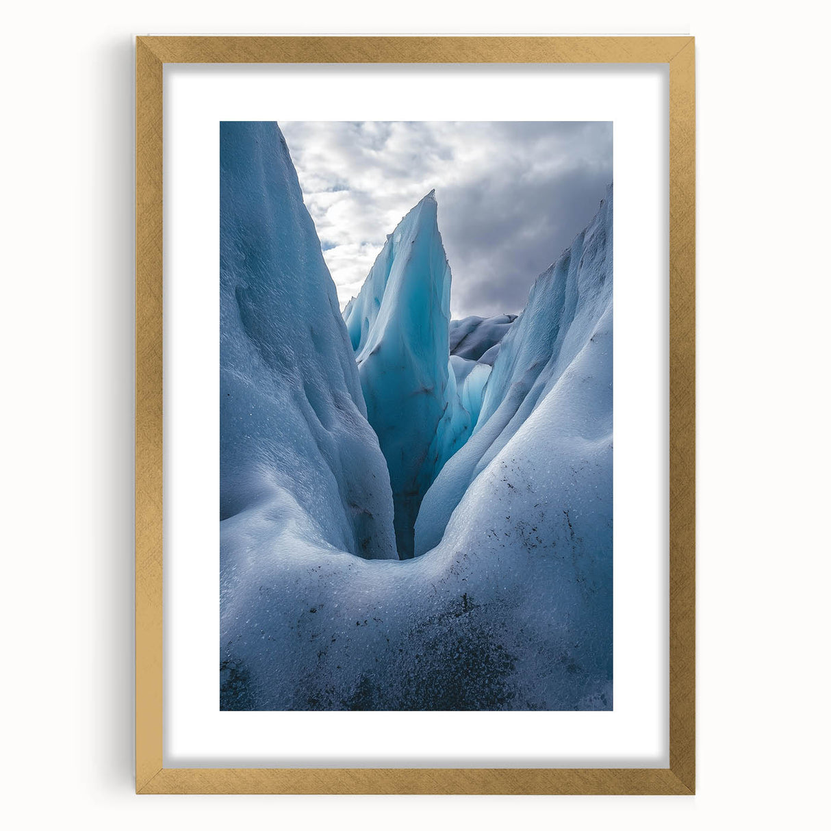 Elegant gold-framed landscape artwork featuring majestic cliffs with a textured mat, perfect for enhancing home decor and adding a touch of sophistication.